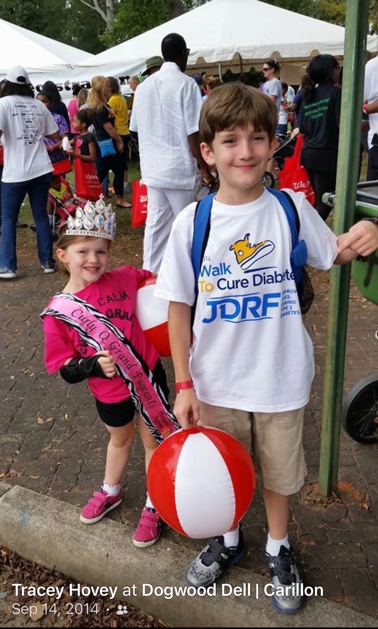 Young Lexie Hovey in crown and sash at the 2014 JDRF Walk to Cure Diabetes at Dogwood Dell